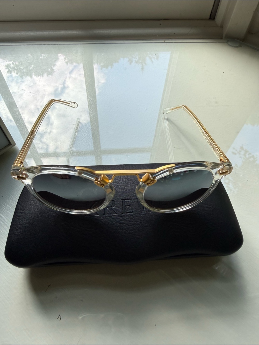 Krewe St Louis Clear frame Grey mirrored lenses sunglasses